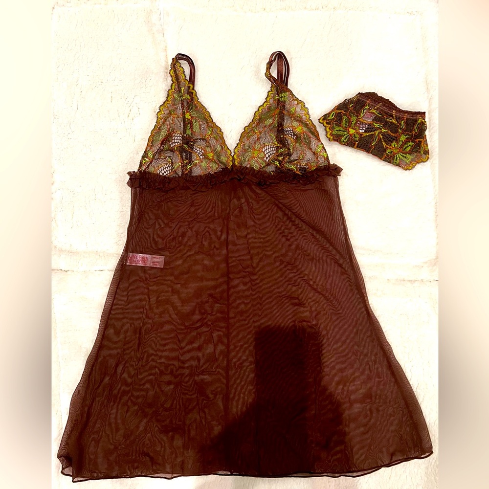 Brown and green lace teddy made in Colombia size Large. Runs small.